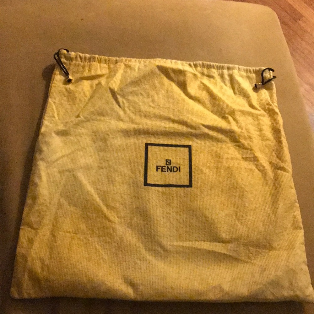 Dark navy with decorative white zipper trim Fendi clutch with dust bag.